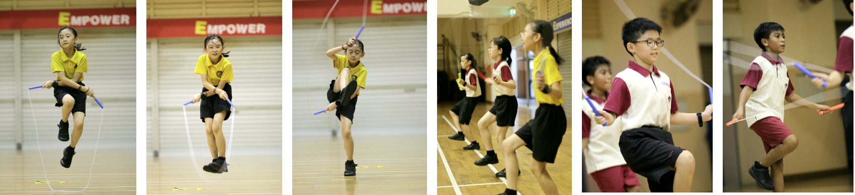 Six school children in uniforms jump rope with blue handles in a gymnasium with an Empower banner.